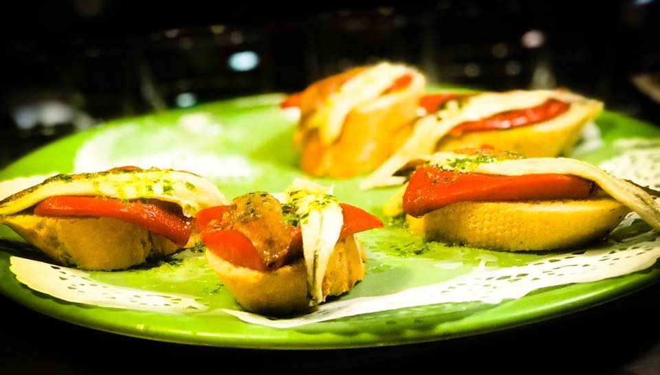 Anchovy and White Anchovy over Roasted Red Pepper